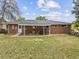 Expansive backyard with a covered patio that is perfect for outdoor entertaining and relaxation at 9120 W 3Rd Pl, Lakewood, CO 80226