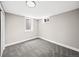 This bedroom is well-lit with neutral walls, and has a carpeted floor and one window for natural light at 9120 W 3Rd Pl, Lakewood, CO 80226
