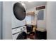 Laundry room featuring a stacked washer and dryer at 8881 Judson St, Westminster, CO 80031
