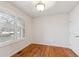 This is a bedroom featuring plantation shutters and hardwood floors at 9118 W 50Th Ln # 5, Arvada, CO 80002