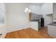 Bright dining room featuring hardwood floors, and a modern chandelier at 9118 W 50Th Ln # 5, Arvada, CO 80002