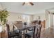 Spacious dining area with hardwood floors and view of living room at 9590 W Eureka Pl, Lakewood, CO 80227