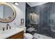 Modern bathroom with sleek vanity, a large shower, and updated fixtures at 13176 Frannys Way, Parker, CO 80138