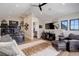 Office space with large screen monitors, decorative deer head, and hardwood floors at 13176 Frannys Way, Parker, CO 80138