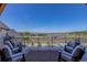 Spacious outdoor patio featuring comfortable seating and stunning views of the surrounding landscape and community at 13176 Frannys Way, Parker, CO 80138