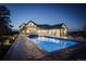 Backyard pool and patio area perfect for evening relaxation with Gathering and friends at 13176 Frannys Way, Parker, CO 80138