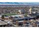 Aerial view of University of Denver campus with snowy landscape and mountains in background at 2042 S Josephine St # 2, Denver, CO 80210