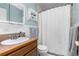 Clean bathroom with shower/tub combo, vanity, and linen closet at 2042 S Josephine St # 2, Denver, CO 80210