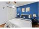 Bright bedroom with double bed, nightstands, and built-in closet at 2042 S Josephine St # 2, Denver, CO 80210