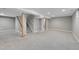 Spacious finished basement offers cozy carpet and bright recessed lighting at 426 Kenton St, Aurora, CO 80010