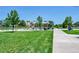 Playground with a variety of equipment, including swings, slides, and climbing structures at 426 Kenton St, Aurora, CO 80010