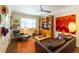 Cozy living room showcasing hardwood floors, contemporary decor, and plenty of space at 740 S Shoshone St, Denver, CO 80223