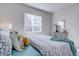 Charming bedroom with window and stylish bedding at 3430 N Cook St, Denver, CO 80205