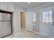 Modern kitchen features stainless steel appliances and white cabinetry at 3430 N Cook St, Denver, CO 80205