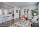 Bright and airy living room with hardwood floors and stylish furnishings at 3430 N Cook St, Denver, CO 80205