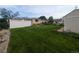Expansive green backyard with a white fence, perfect for outdoor activities and relaxation at 1009 Bush St, Brighton, CO 80601