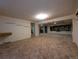 Spacious basement with carpet, open layout, and potential for customization at 1009 Bush St, Brighton, CO 80601