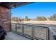 Balcony features black metal railing and clear view of the neighborhood at 9039 E Panorama Cir # C204, Englewood, CO 80112