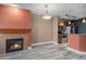 Open layout with a fireplace, that connects the living area to the kitchen at 9039 E Panorama Cir # C204, Englewood, CO 80112