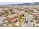 Community aerial showcasing the beautiful homes, landscaping, and mountain views at 2344 S Lupine St, Denver, CO 80228