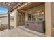 Patio with a hot tub and easy access through the nearby french doors at 2344 S Lupine St, Denver, CO 80228