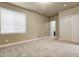 Neutral bedroom with large window, big closet and plush carpeting at 2344 S Lupine St, Denver, CO 80228