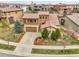 Charming two-story home featuring a stone facade, covered balcony, and well-manicured landscaping in a desirable neighborhood at 2344 S Lupine St, Denver, CO 80228