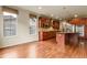 Beautiful kitchen with wood cabinets, stainless steel appliances, and hardwood floors at 2344 S Lupine St, Denver, CO 80228