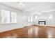 Bright living room with hardwood floors, fireplace, and lots of natural light at 1420 Osceola St, Denver, CO 80204