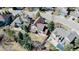 Captivating aerial shot highlighting the home's backyard patio and its location within the community at 7340 Brixham Cir, Castle Pines, CO 80108
