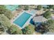 Aerial view of the community pool area, featuring a pool, kiddie pool, and ample lounging space at 7340 Brixham Cir, Castle Pines, CO 80108