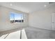 Bright and spacious bedroom with a large window offering a pleasant view at 10022 Wheeling St, Commerce City, CO 80022