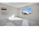 Bright, carpeted bedroom with good window views provides ample natural light at 10022 Wheeling St, Commerce City, CO 80022