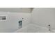 An empty laundry room featuring tile flooring and utility hook ups at 10022 Wheeling St, Commerce City, CO 80022