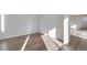 This naturally lit living room features beautiful flooring and ample space for personalization at 10022 Wheeling St, Commerce City, CO 80022