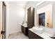 Stylish bathroom with double sinks, modern fixtures, and a large mirror for added convenience at 43010 Ptarmigan Ranch St, Parker, CO 80138
