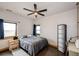 Bedroom with neutral tones, natural light, and ample space for personalization at 43010 Ptarmigan Ranch St, Parker, CO 80138