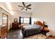 Well-lit bedroom with neutral color palette, area rug and views to the exterior at 43010 Ptarmigan Ranch St, Parker, CO 80138