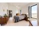 Bright main bedroom with ample closet space and windows that provide great natural light at 43010 Ptarmigan Ranch St, Parker, CO 80138