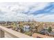 Scenic city views from the rooftop of a condominium building, featuring greenery and skyscrapers in the distance at 800 N Washington St # 804, Denver, CO 80203