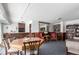 Inviting common room with wood furnishings, bookshelves, and comfortable seating for reading or socializing at 800 N Washington St # 804, Denver, CO 80203