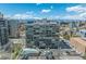 Stunning high-rise featuring many private balconies, a parking lot, and an outdoor pool at 800 N Washington St # 804, Denver, CO 80203
