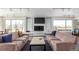 Bright living room features a fireplace, city views, and comfortable sofas at 800 N Washington St # 804, Denver, CO 80203