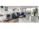 Open living area with sofa and balcony view is great for entertaining at 800 N Washington St # 804, Denver, CO 80203