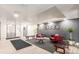 Lobby features sleek tile floors, contemporary furniture, gray accent wall with stylish décor, and elevator access at 800 N Washington St # 804, Denver, CO 80203