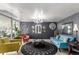 Lobby area featuring wood floors, comfortable seating with designer furniture, and an array of decorative wall mirrors at 800 N Washington St # 804, Denver, CO 80203