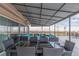 The outdoor patio features a covered seating area with blue cushions and a city view at 800 N Washington St # 804, Denver, CO 80203