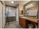 Bathroom with linoleum floors, vanity and vintage lighting at 6625 W 84Th Cir # 48, Arvada, CO 80003