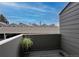 Private covered patio with a lovely view of neighborhood at 6625 W 84Th Cir # 48, Arvada, CO 80003