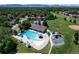 Community pool with recreational facilities, including a playground and sunbathing area at 6625 W 84Th Cir # 48, Arvada, CO 80003